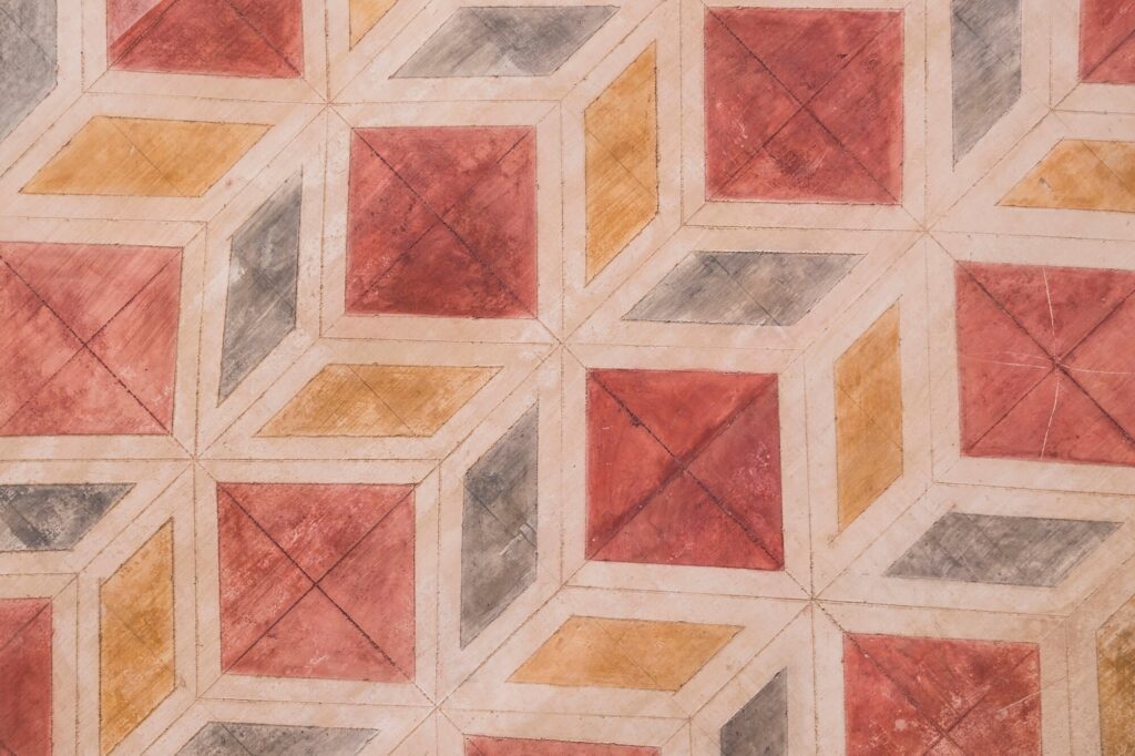Red orange gray and white floor tile pattern