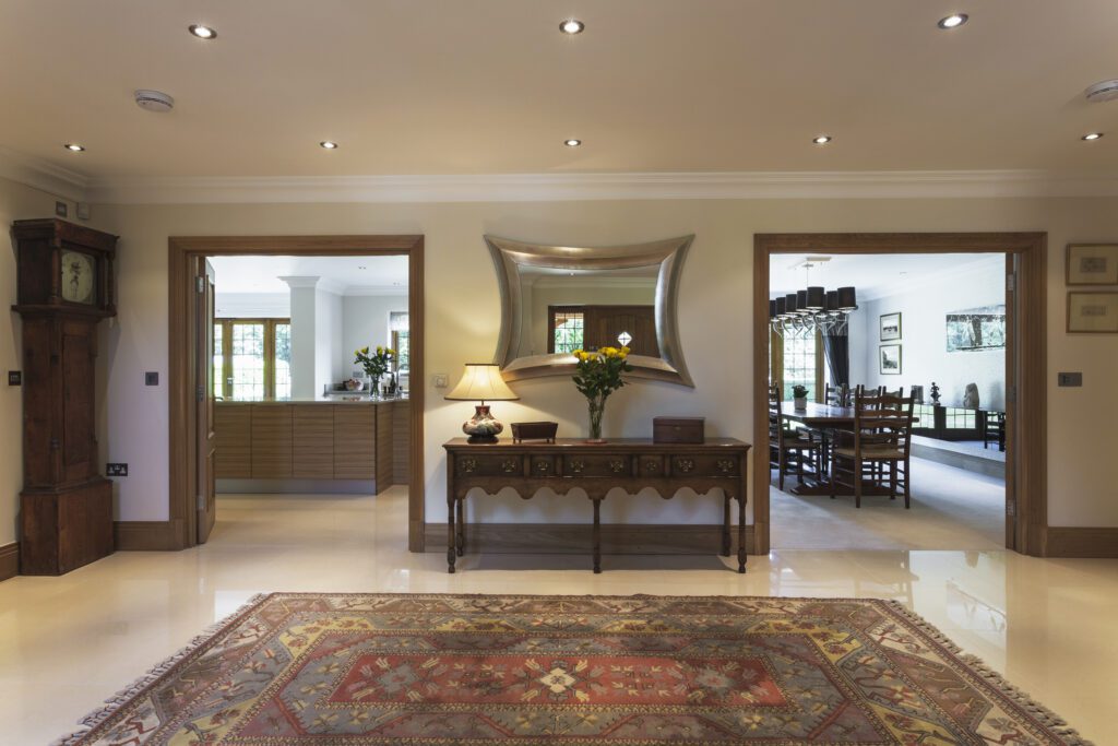 Interior Renovations 1 Rug and doorways in traditional foyer