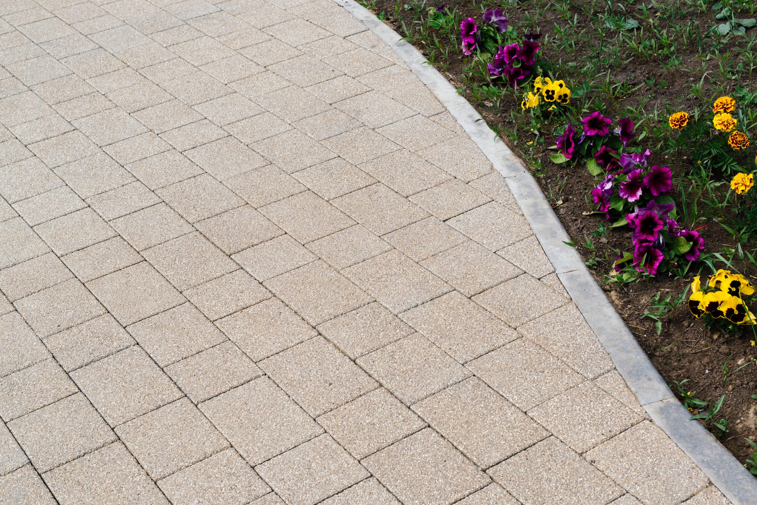 Block Paving And Patio 3 patterned paving tiles, cement brick floor background. High quality photo