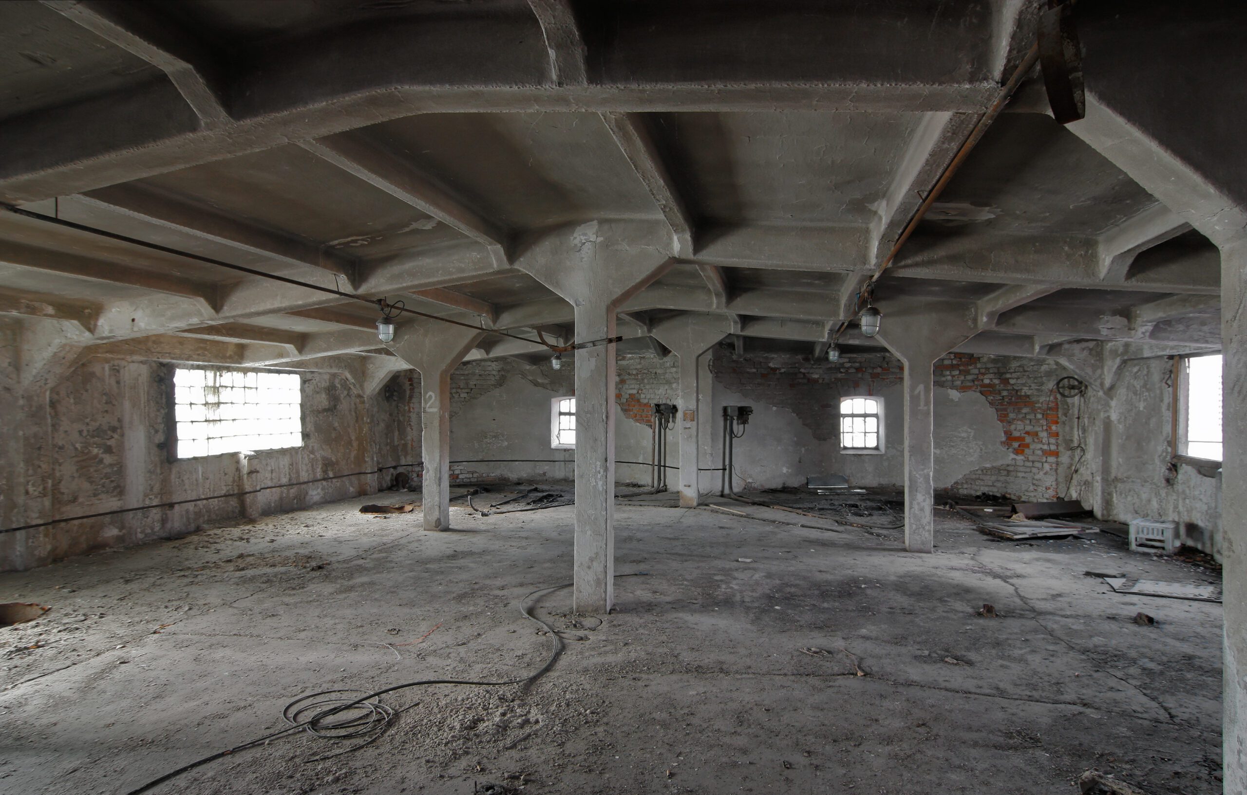 Interior Renovations 7 The interior of an empty industrial room of an old abandoned brewing plant