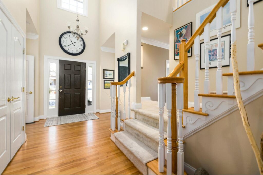 10 Stylish Stair Carpet Ideas 5 A modern home with a wooden staircase and door visible