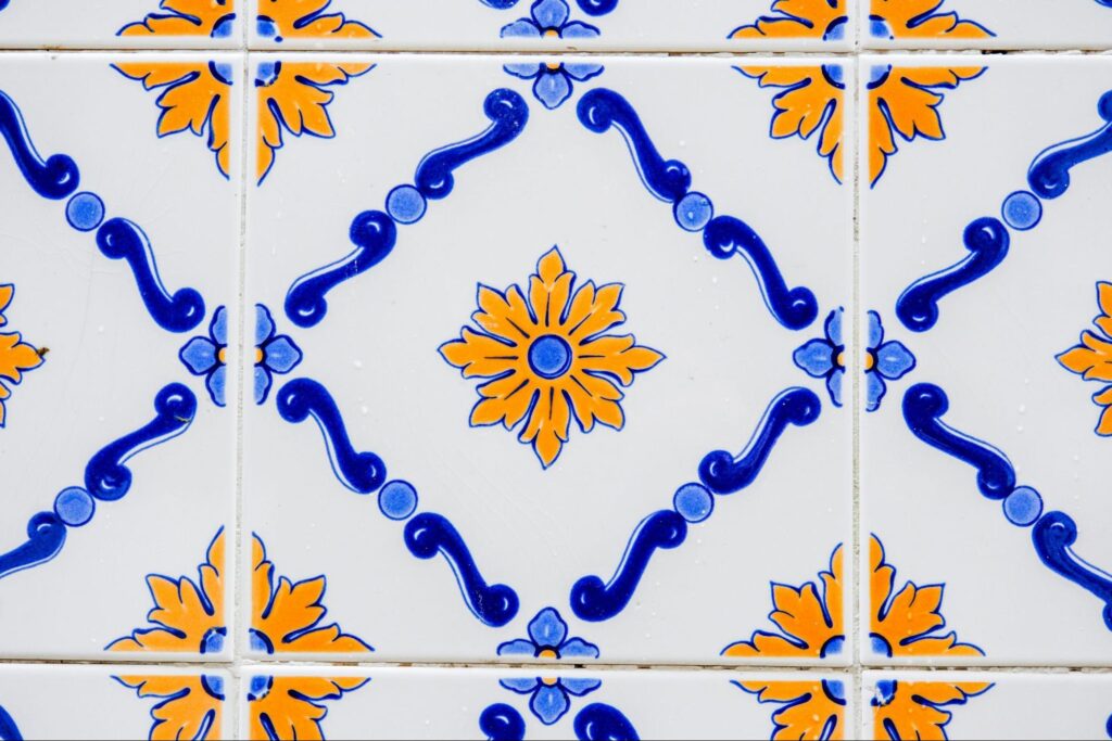 Can You Paint Floor Tiles: A Full Guide 3 Painted floor tiles with yellow flowers