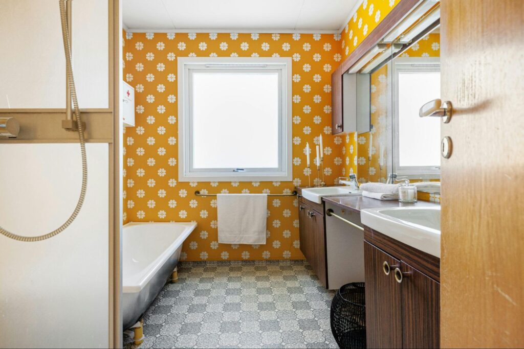 Can You Paint Floor Tiles: A Full Guide 2 Small bathroom with painted yellow tiles
