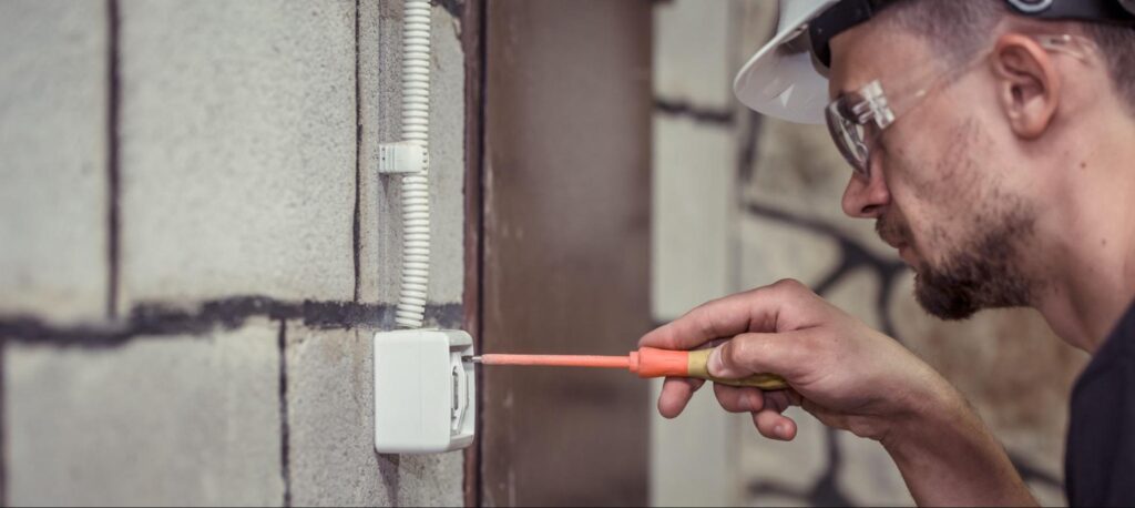 Electrical Safety Zones in Bathrooms (Ireland & UK Explained) 3 installing an electrical socket